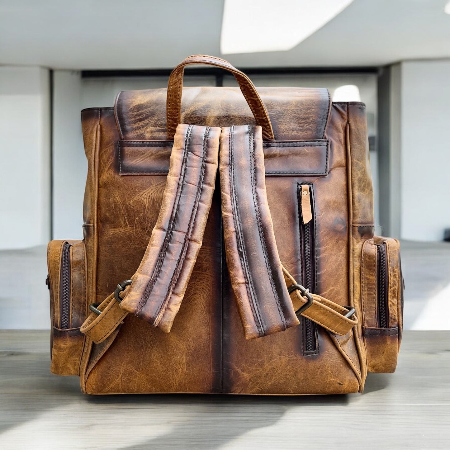 Tooled leather fringe backpack